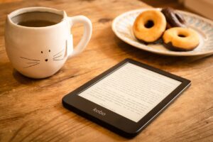 ereader on table with coffee